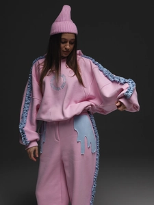 Ensemble de sport sweat à capuche et jogging rose avec détails de volants bleus