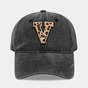 Detail of washed black cotton baseball cap with leopard print letter V embroidery