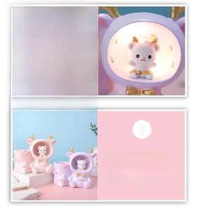 Detailed view of lucky cartoon deer desk organizer with glowing starry night light