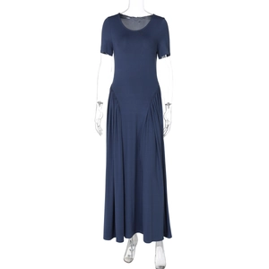 Detail view of navy blue summer dress with elegant side ruching and pleated waist design