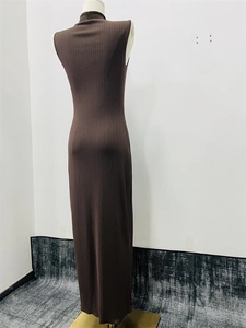 Close-up of mock neck sleeveless pleated knit dress with dark brown ribbed texture
