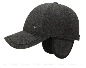 Detail view of winter baseball cap showing ear flaps and thick warm lining for men