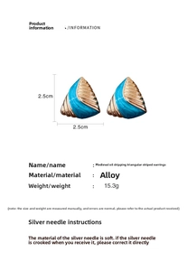 Detail view of vintage blue enamel triangle earrings with golden stripes and size labels