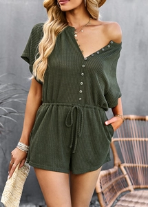 Deep green short sleeve romper with V-neck button closure and drawstring waffle texture
