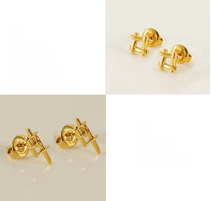 Detail of 18K gold-plated heart stud earring with polished grid geometric structure