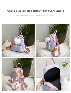Detailed views of tie-dye mini backpack featuring heart patterns and plush pendant charm
