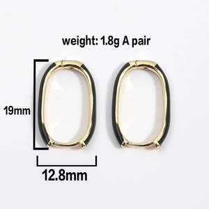 U-shaped gold oval hoop earrings with black enamel inlay and 19mm size details