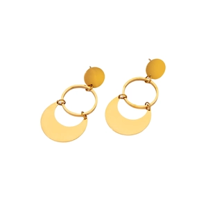 Macro shot of gold geometric earrings with round discs and crescent moon pendants