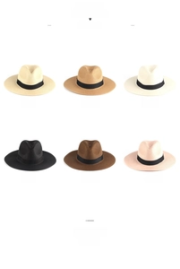 Grid view showing multiple colors of straw Panama hats with black decorative bands