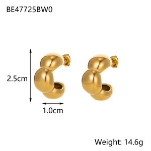 Detailed view of 14K gold plated stainless steel C-shaped earrings with ball design