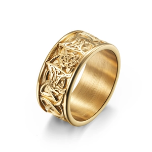 Golden Celtic knot wide band ring in stainless steel with polished finish on white background