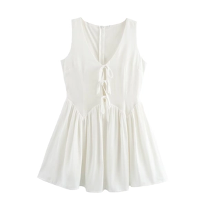 White sleeveless V-neck mini dress with sweet front tie-up bows and pleated hem