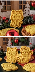 Close-up of cute Christmas cat cookies made with 3D themed baking molds and cutters