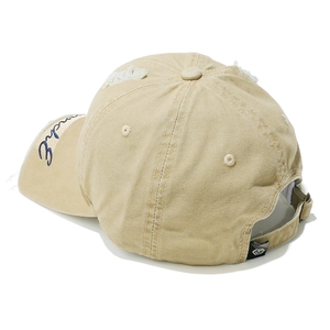 Detail of distressed khaki baseball cap with Blannche embroidery and adjustable strap