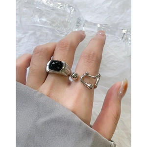 Elegant S925 silver ring featuring black agate main stone with sleek minimalist design