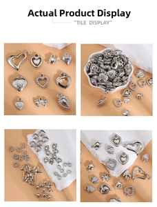 Macro detail of various Y2K silver heart and bow metal charms for DIY jewelry making