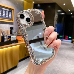 Close-up of wavy silver mirror phone case with irregular metallic edges for iPhone