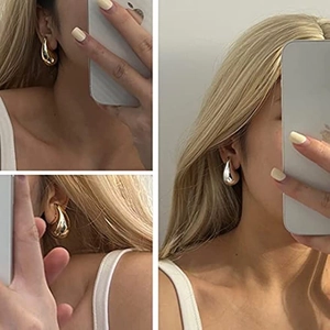 Polished hollow waterdrop earrings in gold and silver finish for a minimalist chic look