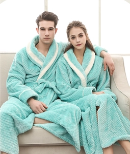 Detail of mint green flannel bathrobe with pineapple grid texture and contrast piping