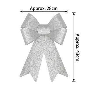 Silver glitter Christmas bow ornament measuring approx 28cm width and 43cm height