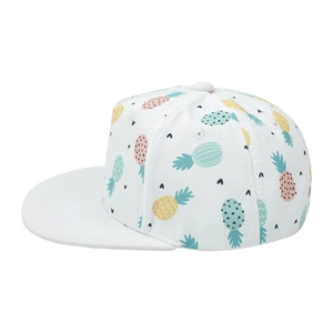 Detailed side view of white kids baseball cap featuring colorful pineapple prints