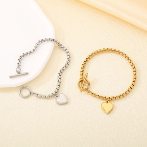 Lussuosi bracciali con ciondolo a cuore in acciaio inossidabile e chiusura OT dorata
