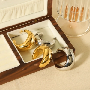 Minimalist 18K gold and silver stainless steel C-shaped hoop earrings in a pair
