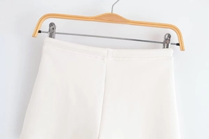 Detail of white casual shorts waistband with premium double-sided woven cotton fabric