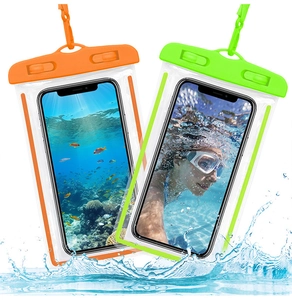 Waterproof phone pouches in orange and green splashing in water for swimming and diving