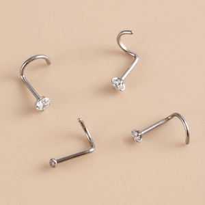G23 titanium nose studs with clear cubic zirconia crystals in S-shape and L-shape designs