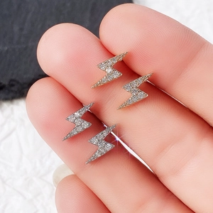 Minimalist lightning bolt stud earrings with cubic zirconia inlay in gold and silver finish