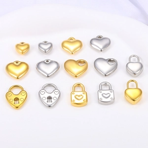 Polished heart and lock charms in gold and silver finish for DIY jewelry necklaces