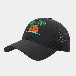 Detail of black breathable quick-dry baseball cap with palm tree embroidery and laser-cut holes