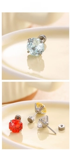 Macro detail of six-claw 8mm colorful zircon earrings with secure screw back fastener