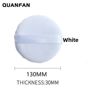 Detail of 130mm large plush powder puff with white ribbon handle and 30mm thickness