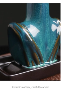 Macro detail of blue-green glazed ceramic figurine with fine texture and flowing glaze