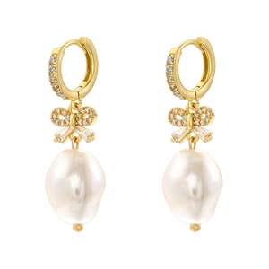 Elegant gold bow earrings with baroque pearls and sparkling crystals on white background