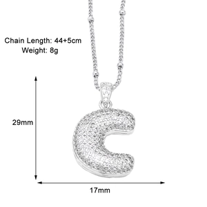 Detailed sizing of letter C necklace with cubic zirconia showing 44+5cm chain length