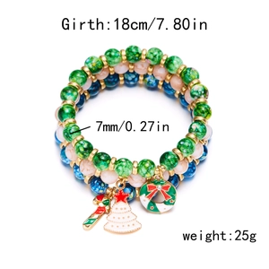 Three-piece Christmas beaded bracelet set with tree, wreath, and candy cane pendants