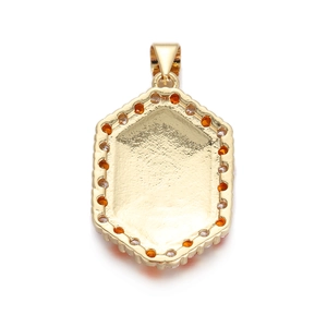 Macro view of gold-plated hexagonal pendant back with zircon inlay and fine texture