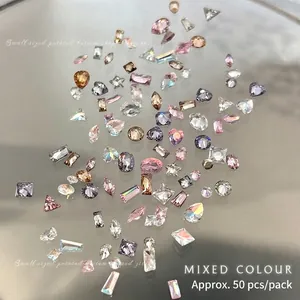 Mix of small multi-shaped 50pcs nail art zircons in pink champagne and blue colors