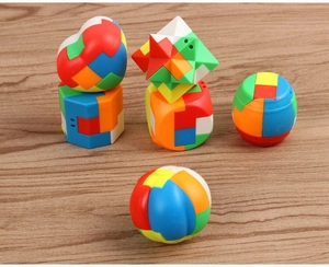 Close-up of colorful heart and star shaped plastic puzzles on a wooden background