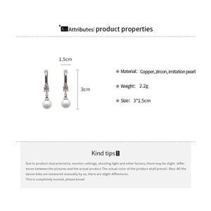 Detailed view of zircon and pearl drop earrings showing dimensions and material specifications