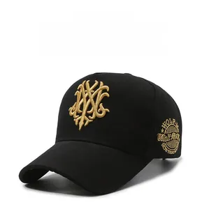 Detail of black cotton twill baseball cap featuring 3D gold embroidery and round side patch
