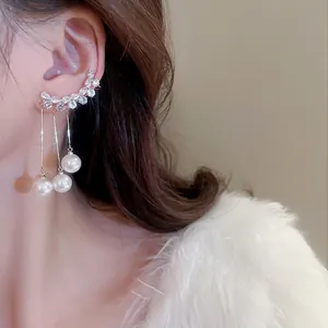 Elegant silver needle pearl tassel cuff earrings with crystals and hanging metal chains