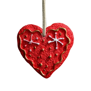 Red resin heart Christmas ornament with white snowflakes and gold textured edges
