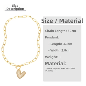 Close-up of gold-plated heart pendant with full zircon inlay and 50cm oval link chain