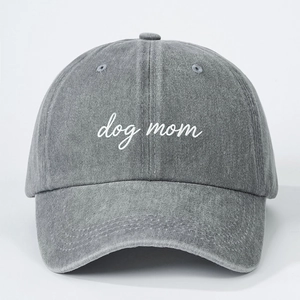 Vintage washed grey cotton baseball cap featuring white Dog Mom embroidery text on front