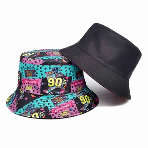 Reversible bucket hat set with minimalist black and vibrant 90s retro pop art patterns