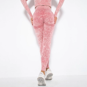 Set yoga rosa effetto lavato con top corto a maniche lunghe e leggings modellanti